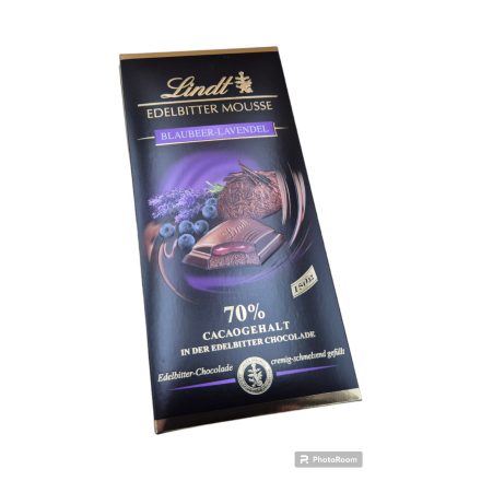 Lindt-Étcsokoládé, lágy csokoládé krémmel (26%) és áfonya-levendula töltelékkel (18%). 